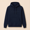 A navy blue pullover hoodie with 'The Open University Est. 1969' embroidered in light gray on the chest, displayed flat against a warm beige background.